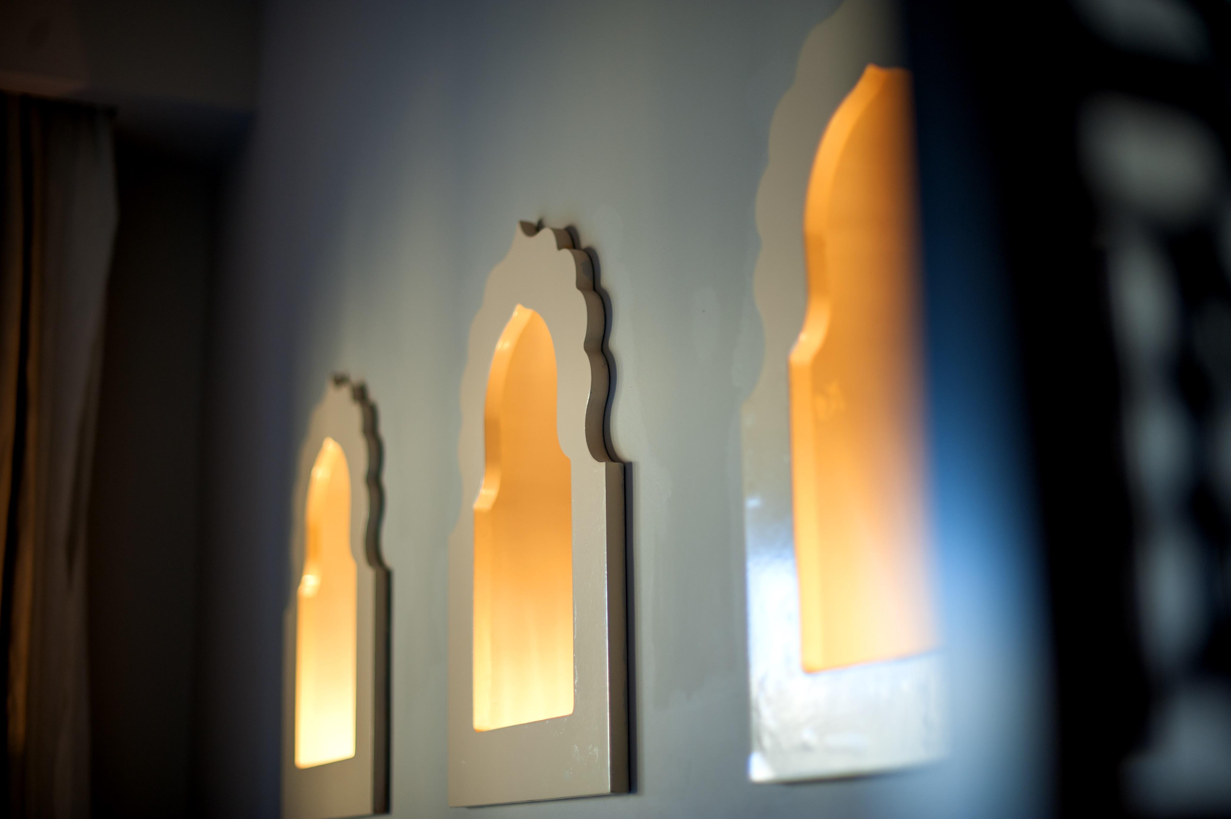 Sunrise Arabian Beach Resort Sharm el-Sheikh Exterior photo A set of three windows in the wall of a house