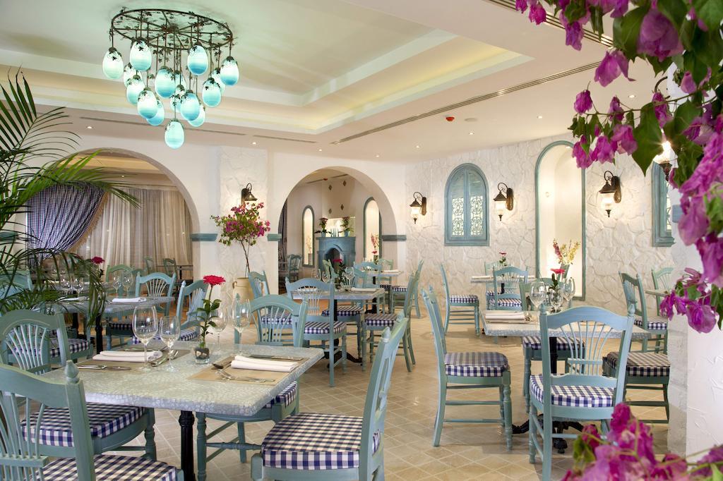 Sunrise Arabian Beach Resort Sharm el-Sheikh Exterior photo Restaurant at the Grand Hotel